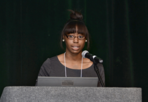 Biology senior Kellyn Pollard presents at the 12th Annual K-INBRE Symposium in 2014.